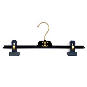 CHANEL CC gold metal logo black velvet velour bottoms clothing closet hanger